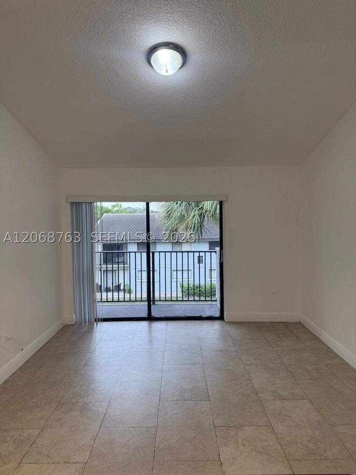 7110 Nw 179th St #310 - Photo 5 of 18