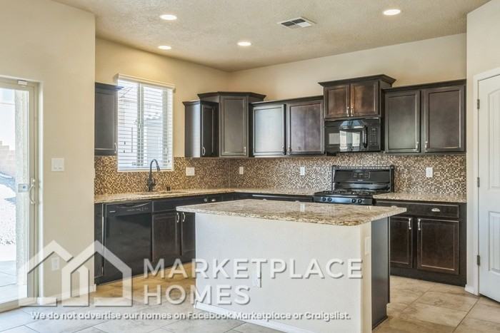 7114 Wasilla Dr Ne - Photo 7 of 32