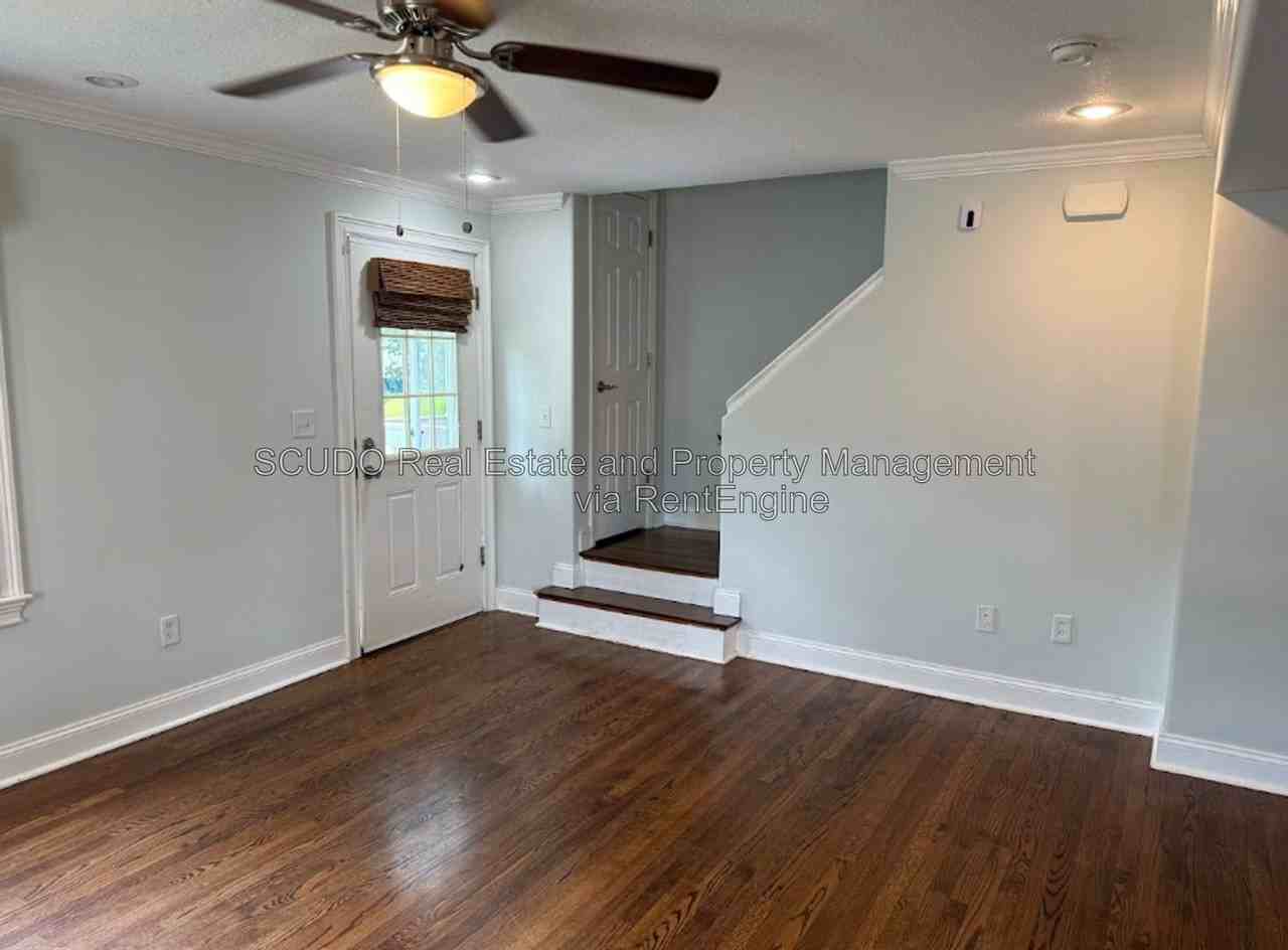 418 E 63rd Ter - Photo 7 of 19