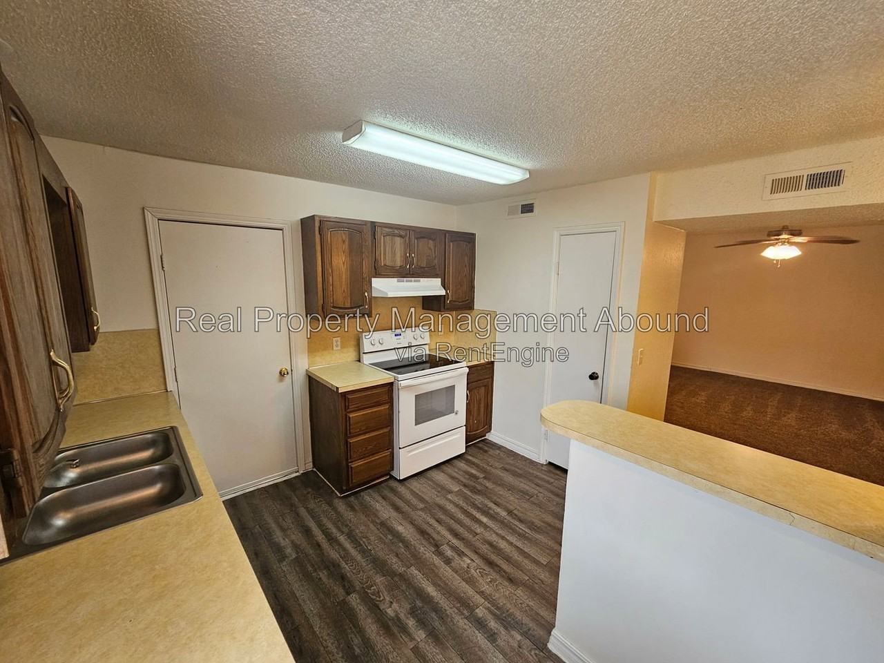8009 N 117th East Ave - Photo 3 of 16