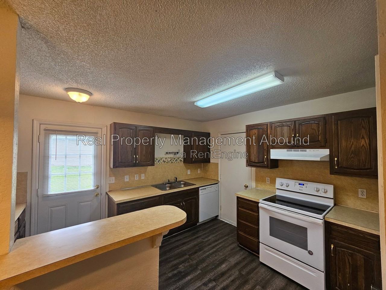 8009 N 117th East Ave - Photo 4 of 16