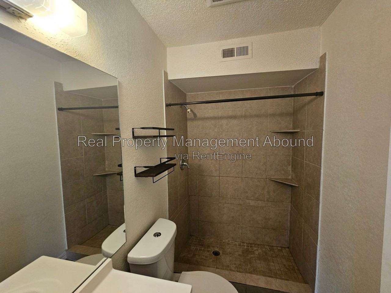 8009 N 117th East Ave - Photo 7 of 16