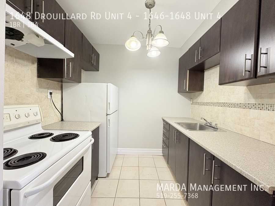 1648 Drouillard Rd Unit 4 - Photo 3 of 13