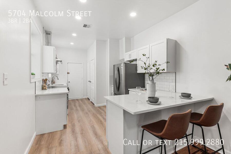 5704 Malcolm St - Photo 7 of 23