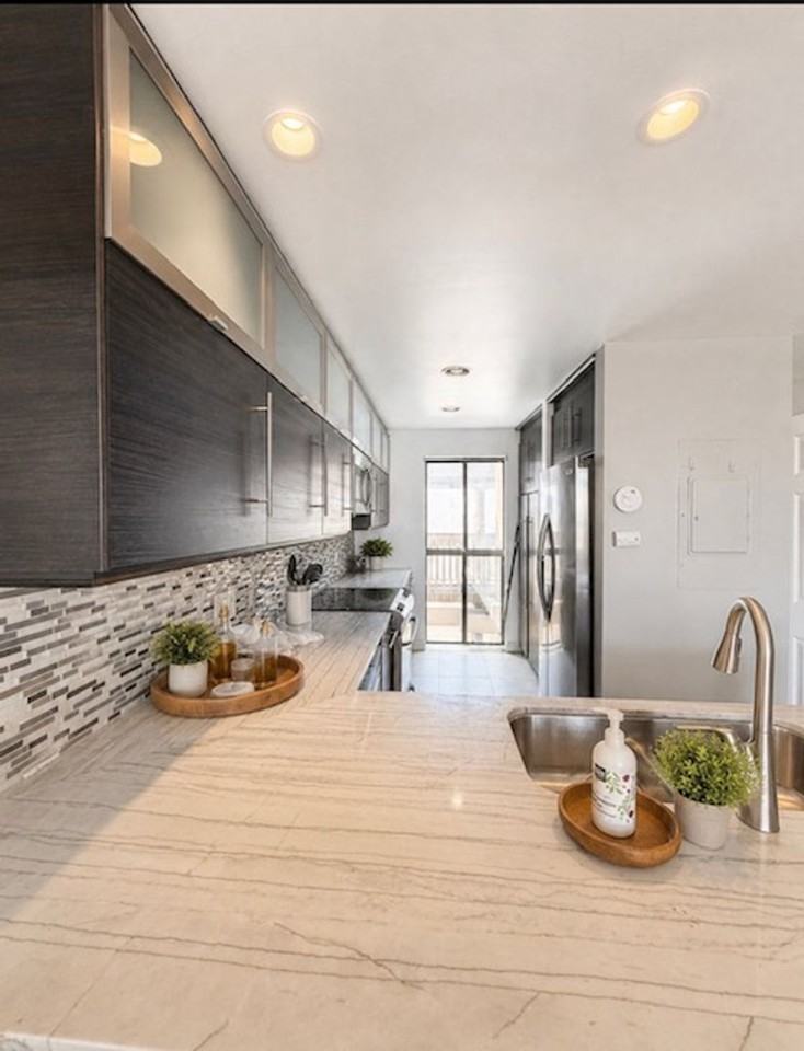 7334 Marina Pacifica Dr N - Photo 2 of 18