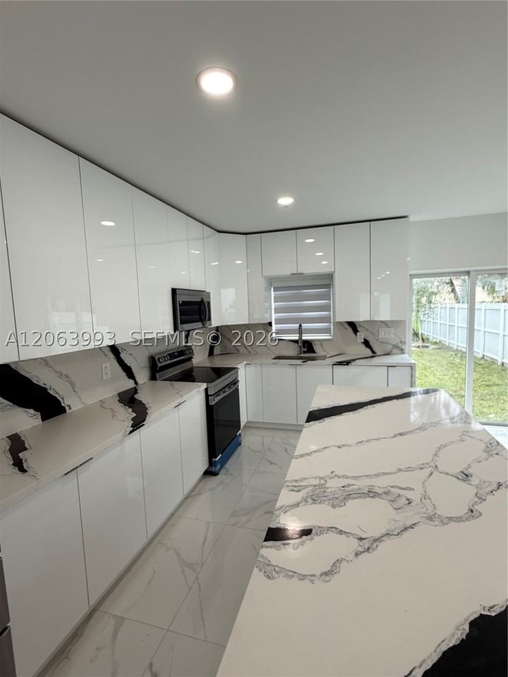 2100 Nw 102nd St #1 - Photo 4 of 40