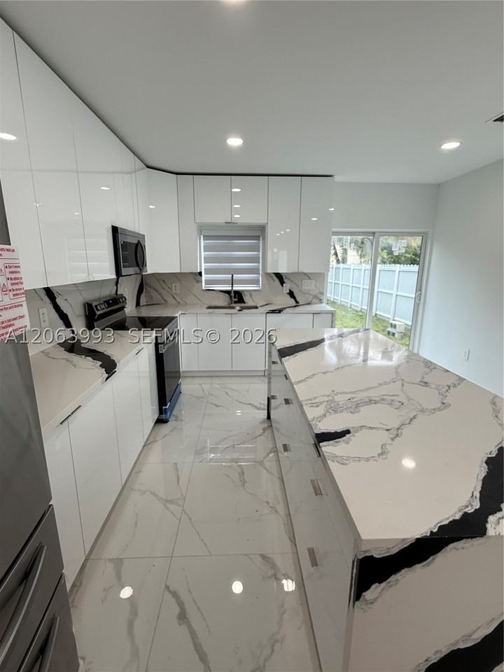 2100 Nw 102nd St #1 - Photo 5 of 40
