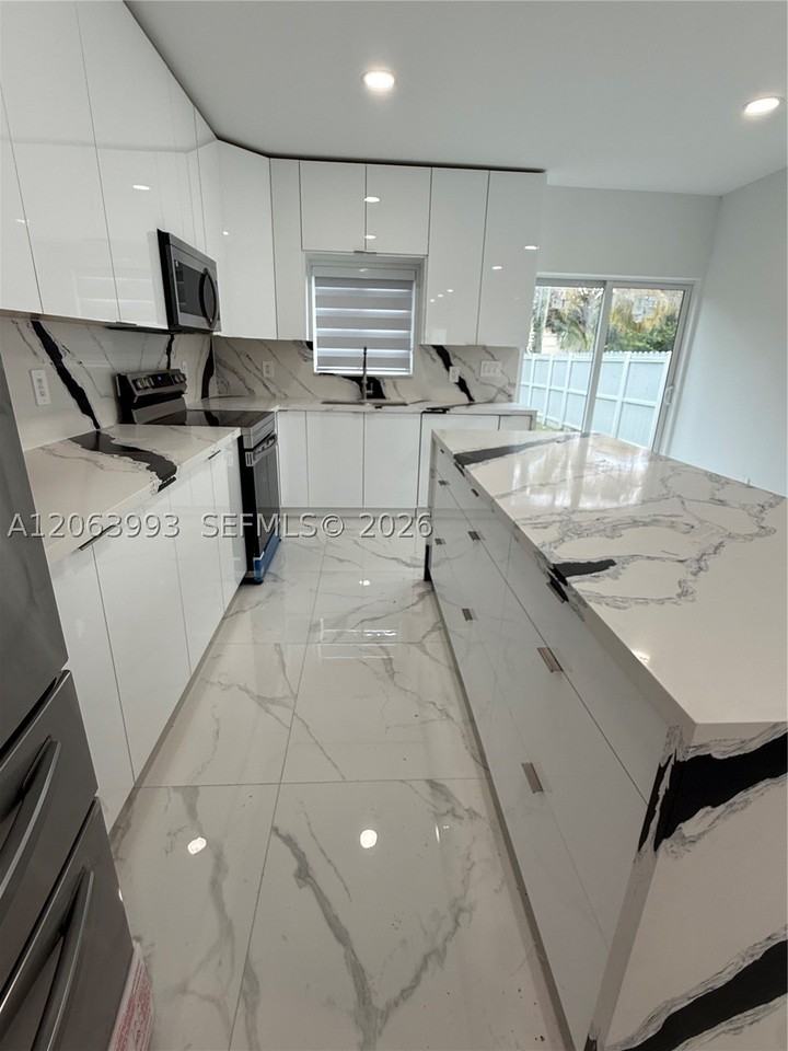 2100 Nw 102nd St #1 - Photo 6 of 40