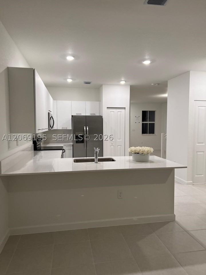 12613 Nw 23rd Pl #0 - Photo 2 of 7