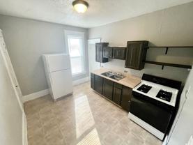 214 E 10TH ST - Photo 1 of 1
