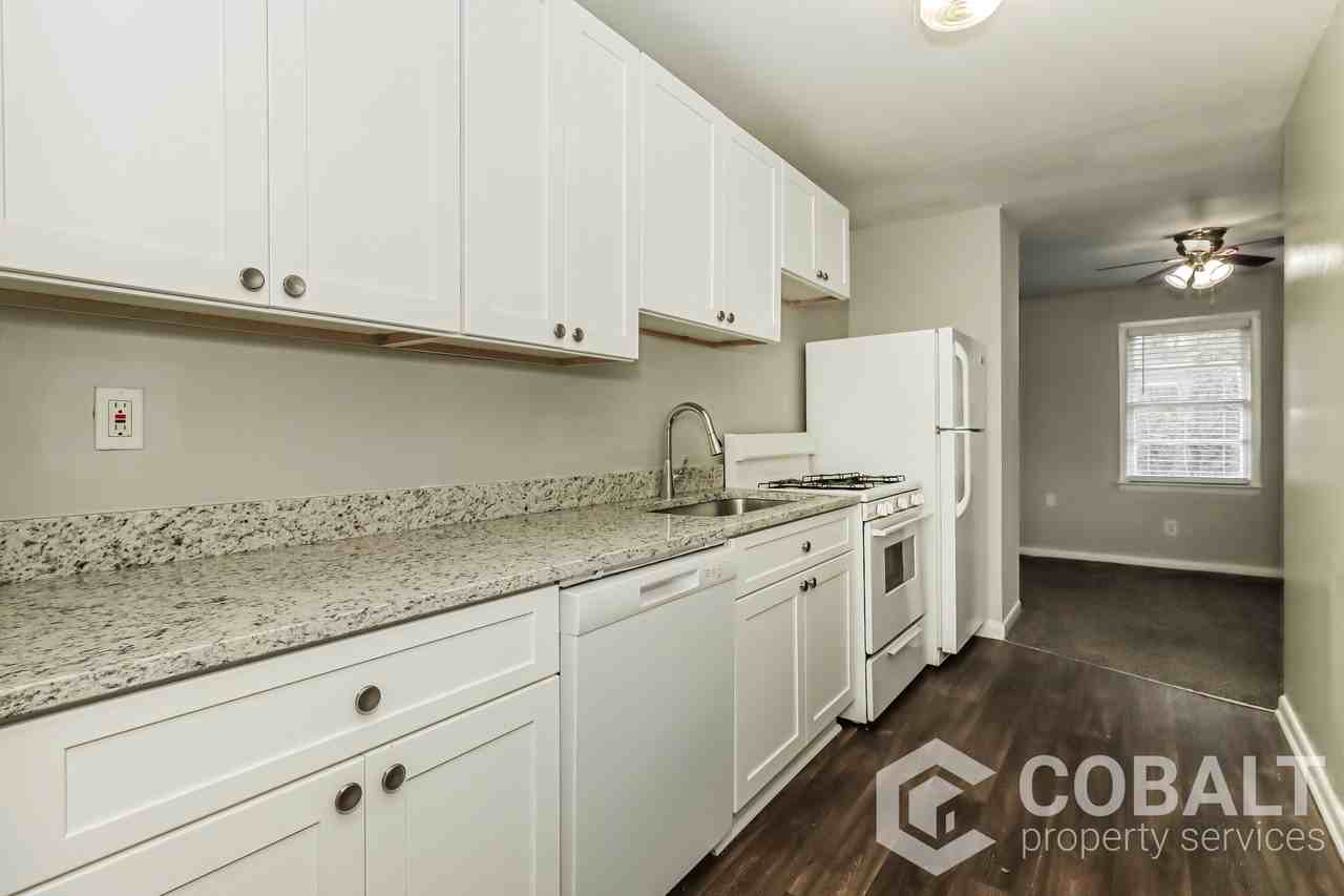 1992 Woodland Hills Ave Nw #1 - Photo 4 of 17