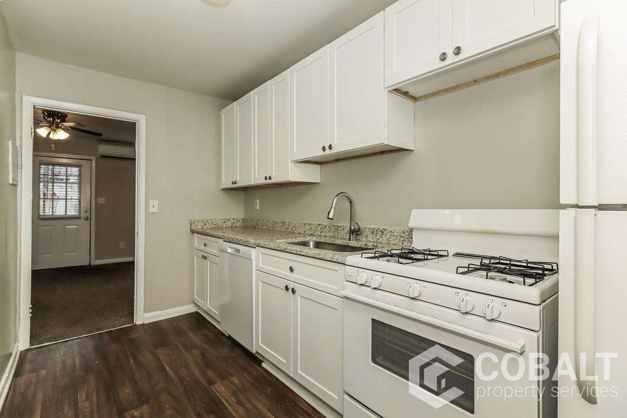 1992 Woodland Hills Ave Nw #1 - Photo 5 of 17