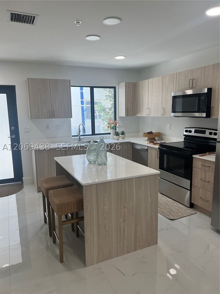 7450 W 4th Ave #108 - Photo 6 of 18