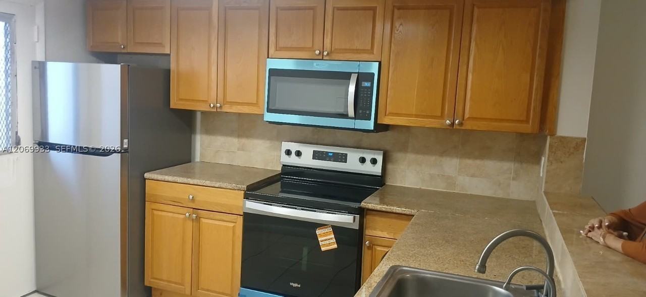 1591 Ne Miami Gardens Dr #205 - Photo 3 of 26