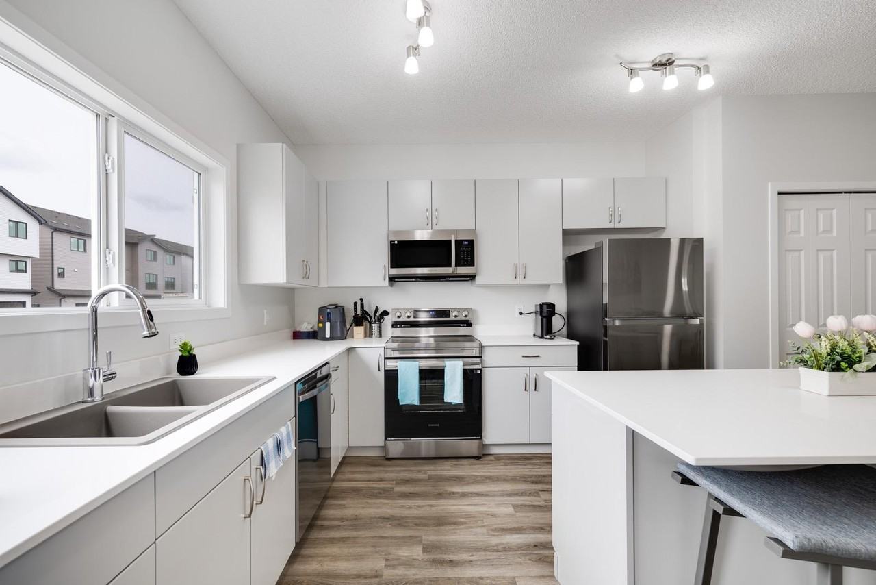1227 16 Ave Nw - Photo 7 of 15