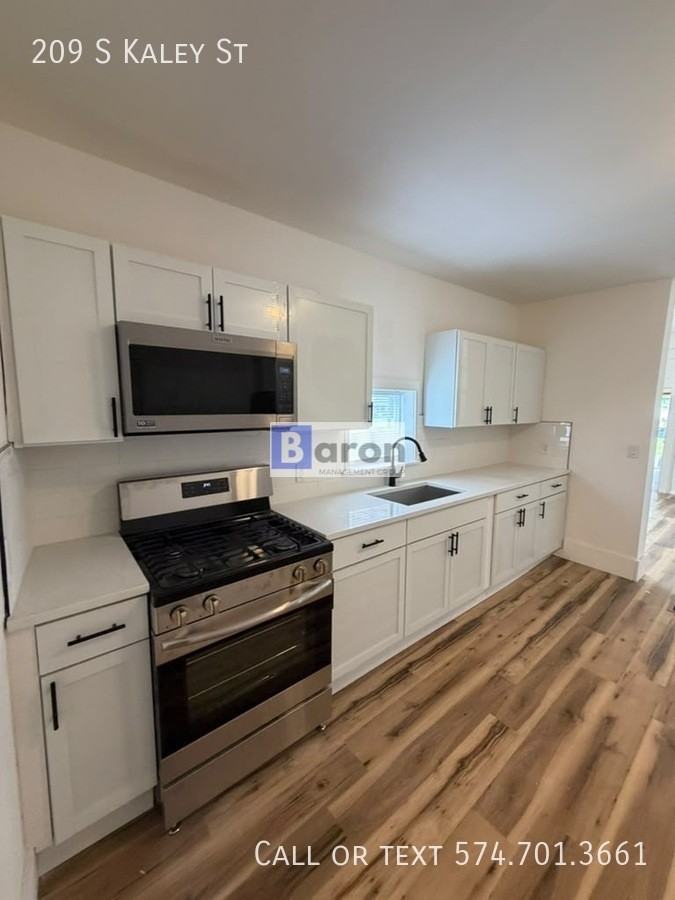 209 S Kaley St - Photo 4 of 22