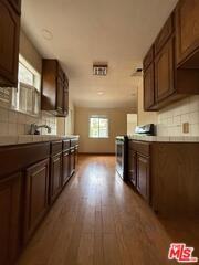 15133 Blackhawk St - Photo 4 of 8