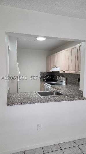 6730 W 26th Ct #12-15 - Photo 3 of 16