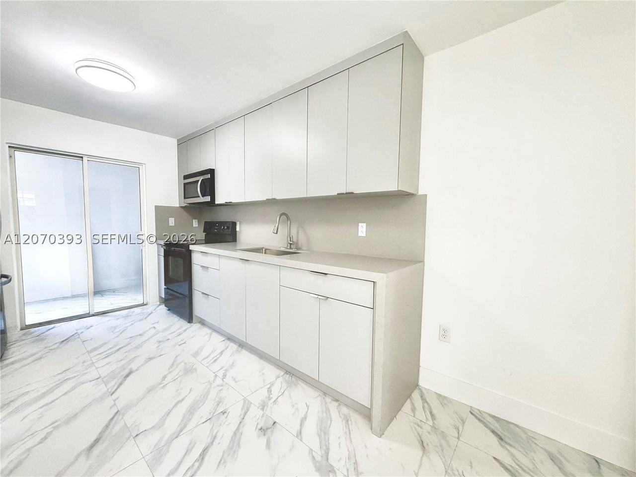 1270 W 42nd St #A103 - Photo 6 of 14