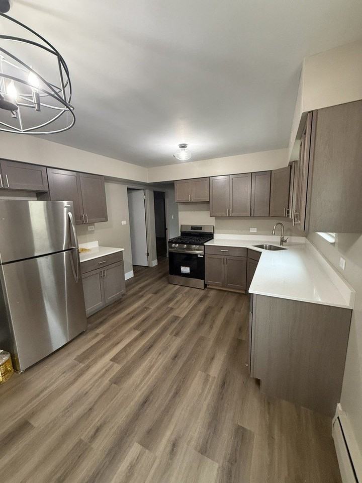 5721 W Addison St #1 - Photo 2 of 17