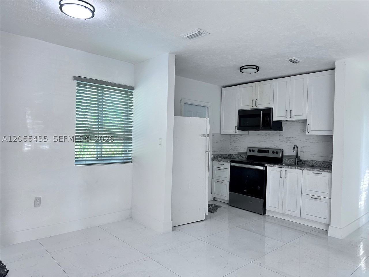 12780 Nw 16th Ave - Photo 2 of 14