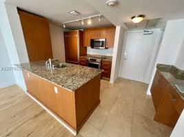 featured image of 10275 Collins Ave #415