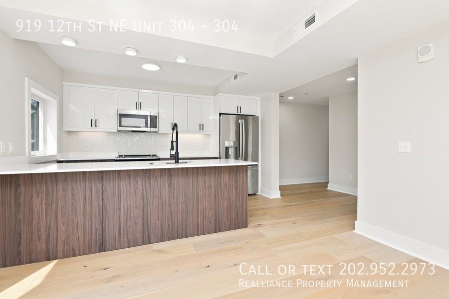 919 12th St Ne Apt 304 #304 - Photo 4 of 14