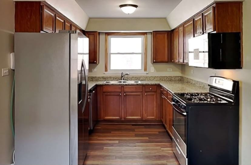8008 Natchez Ave - Photo 4 of 6