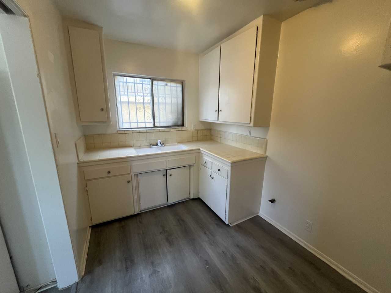1377 W 36th St #1 - Photo 3 of 3