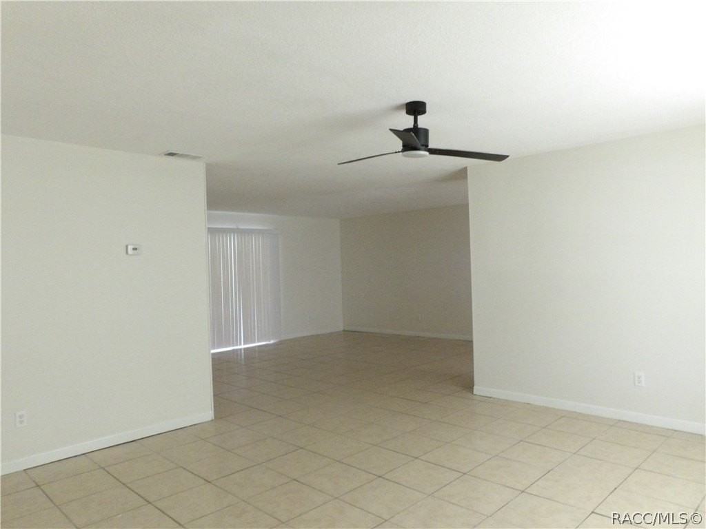 8935 N Basswood Ave - Photo 3 of 16