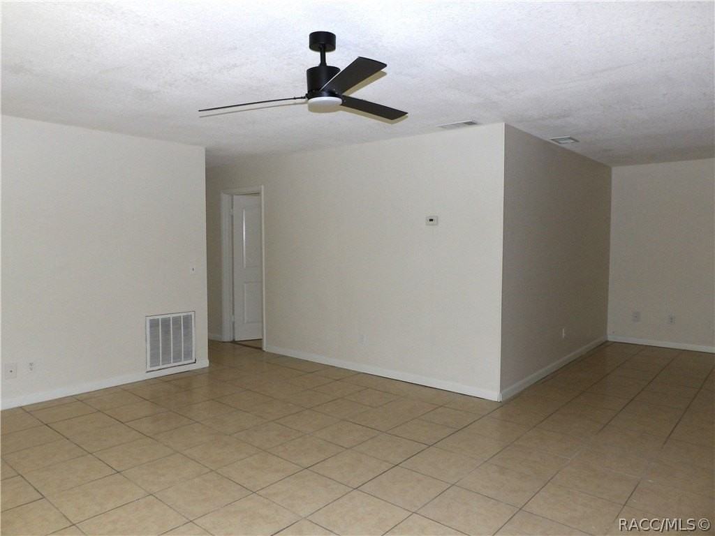 8935 N Basswood Ave - Photo 4 of 16