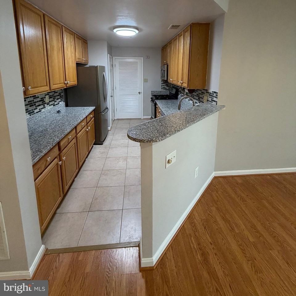 10730 Symphony Way #101 - Photo 6 of 23