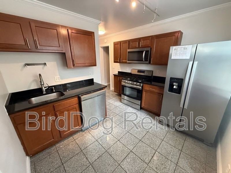 215 E 14th Ave - Photo 3 of 7