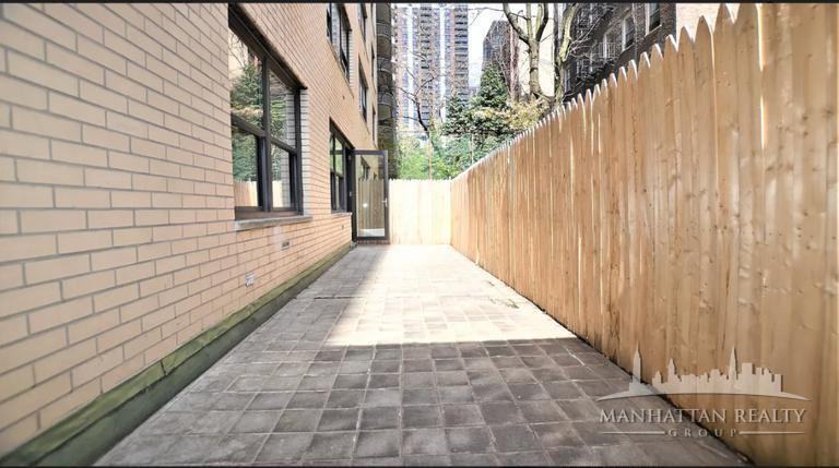 E 49th St - Photo 4 of 13