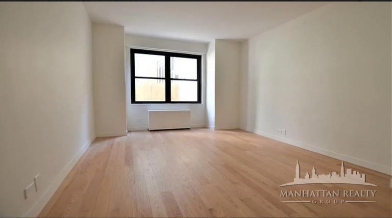 E 49th St - Photo 6 of 13