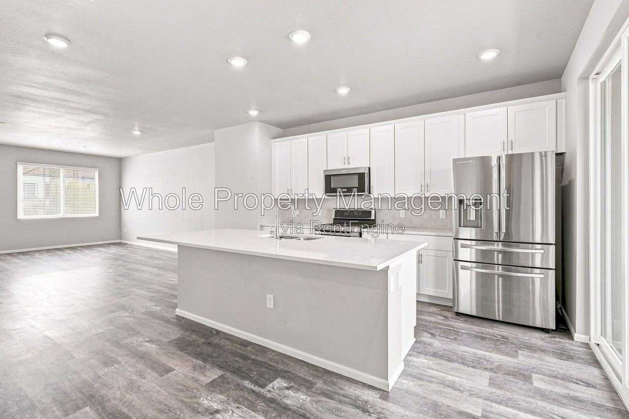 12231 W 57th Dr - Photo 5 of 31