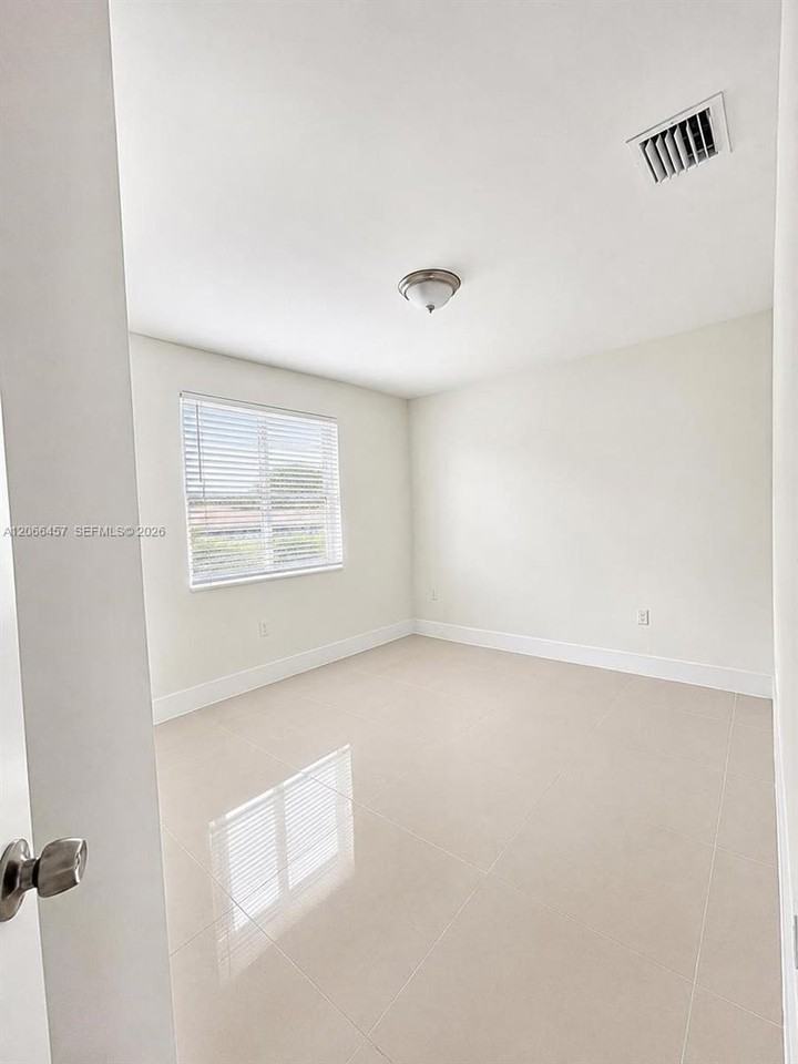 4491 Nw 23rd Ave - Photo 4 of 11