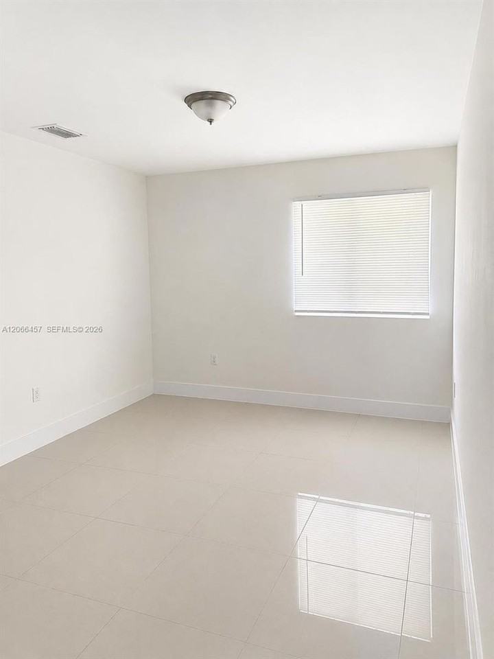 4491 Nw 23rd Ave - Photo 5 of 11