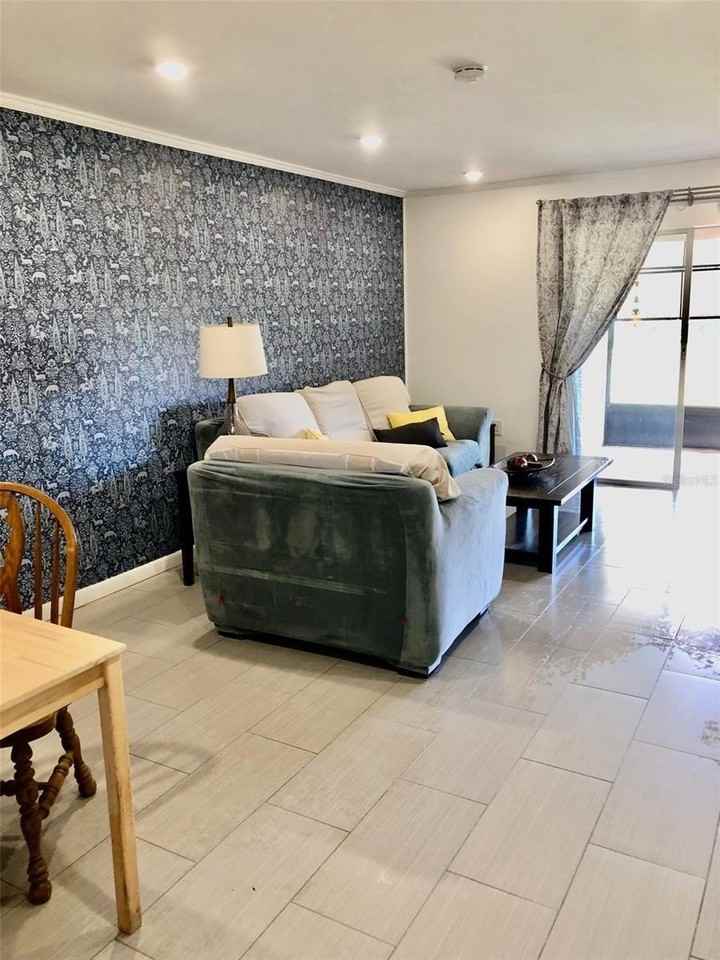 102 Capri Isles Blvd - Photo 4 of 32