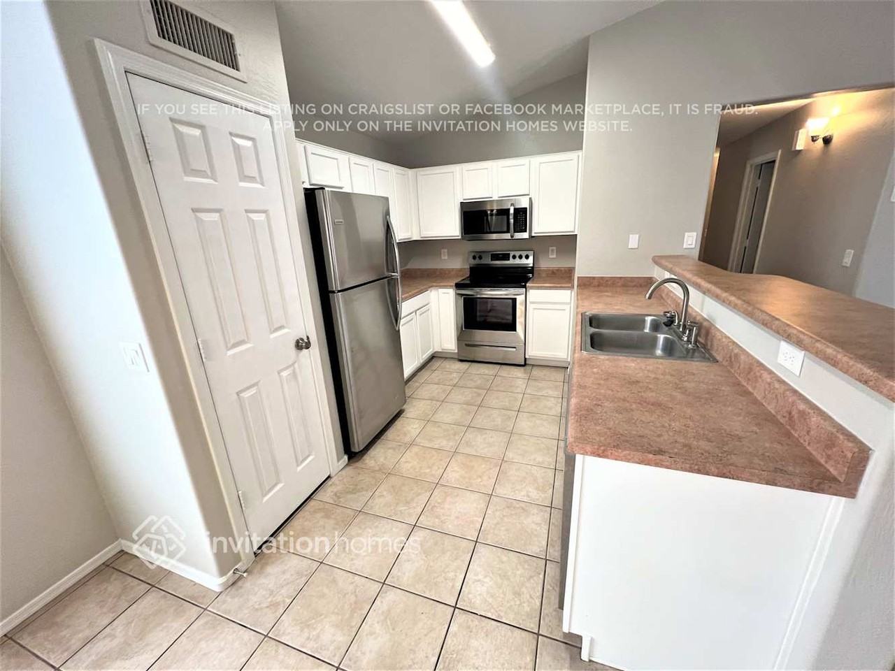 14702 N 124th Ln - Photo 4 of 9