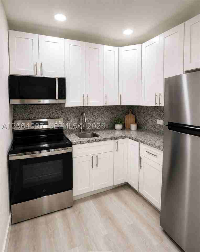 12001 W Biscayne Canal Rd #1 - Photo 2 of 5