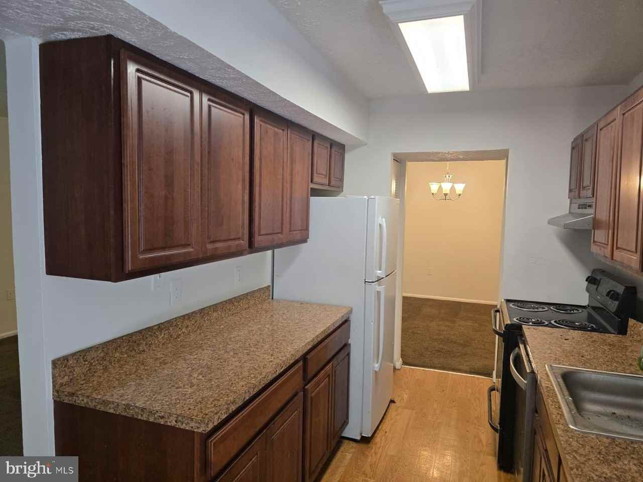 7814 Hanover Pkwy #304 - Photo 6 of 15