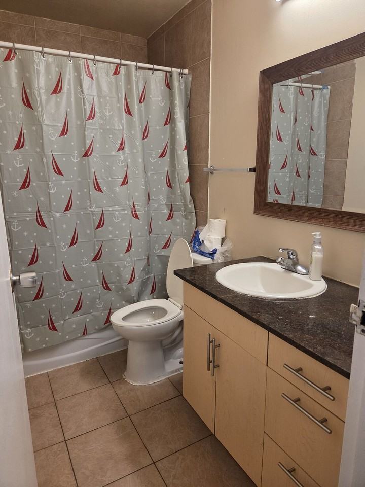 8315 29 Ave Nw - Photo 6 of 13