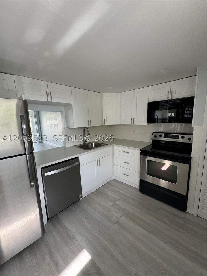 1398 Ne 191st St #C305 - Photo 2 of 26