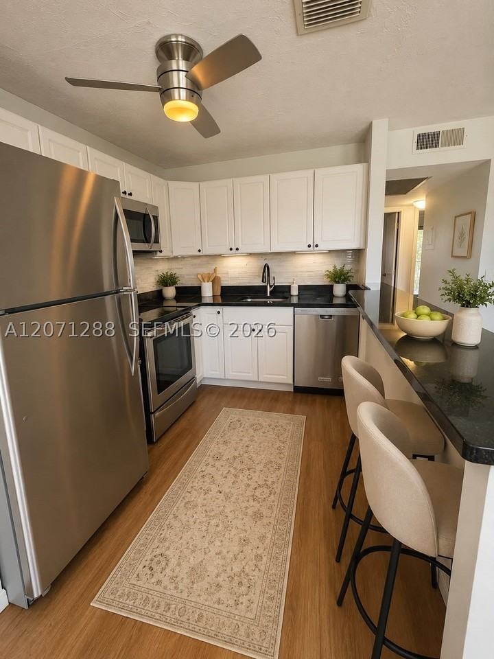 13450 Sw 3rd St #404D - Photo 4 of 17