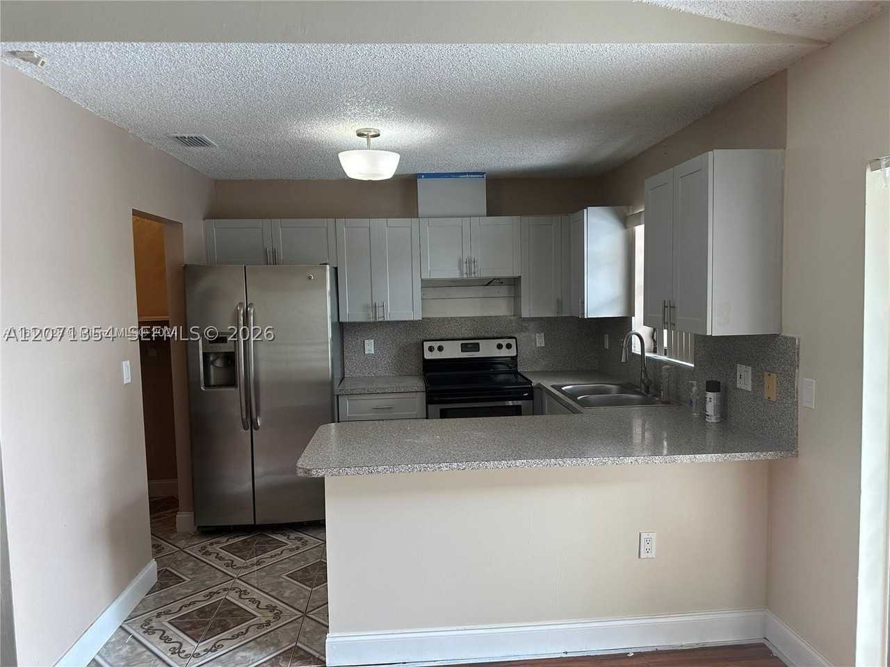 6991 Nw 169th Ter - Photo 7 of 11