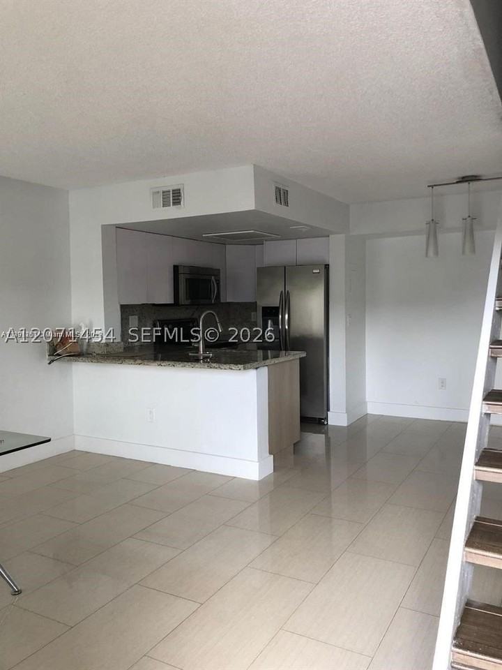 8670 Nw 6th Ln #4-208 - Photo 2 of 15
