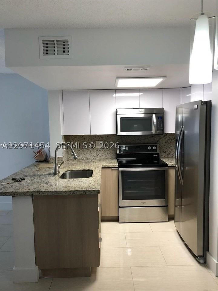 8670 Nw 6th Ln #4-208 - Photo 4 of 15
