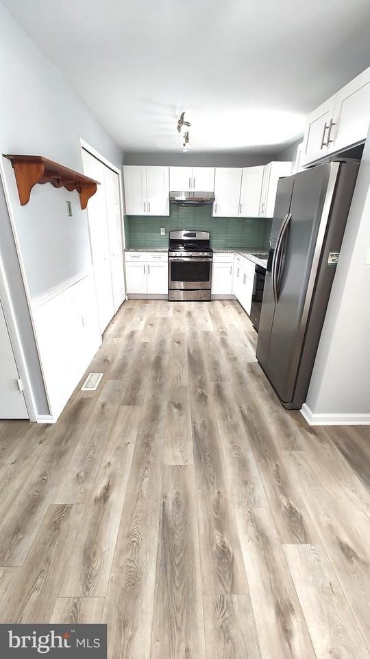 8027 Shore Rd - Photo 4 of 42