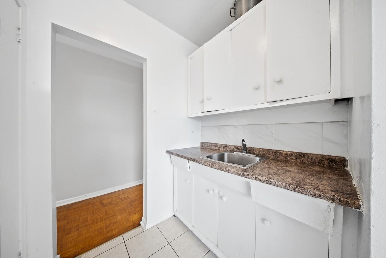 1617 Victoria Park Avenue - Photo 3 of 9